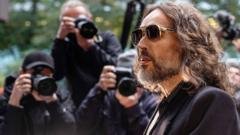 Russell Brand was a ‘sexual predator’, prosecution alleges as rape trial begins